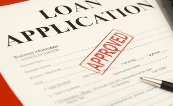 A stamped approved loan application.jpg